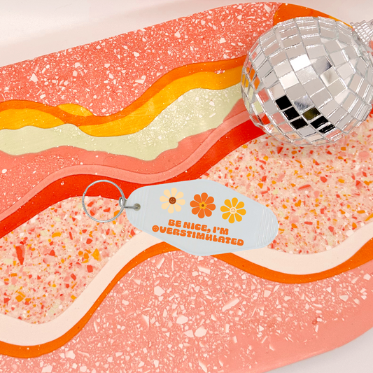Be Nice Im Overstimulated Keychain