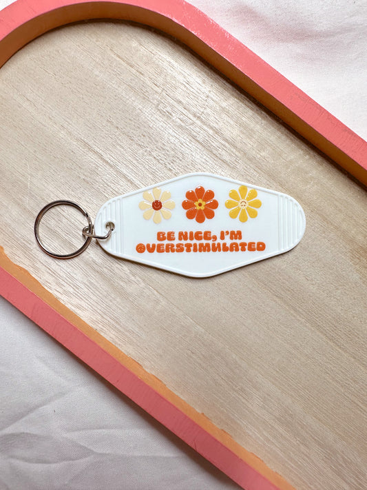 Be Nice Im Overstimulated Keychain